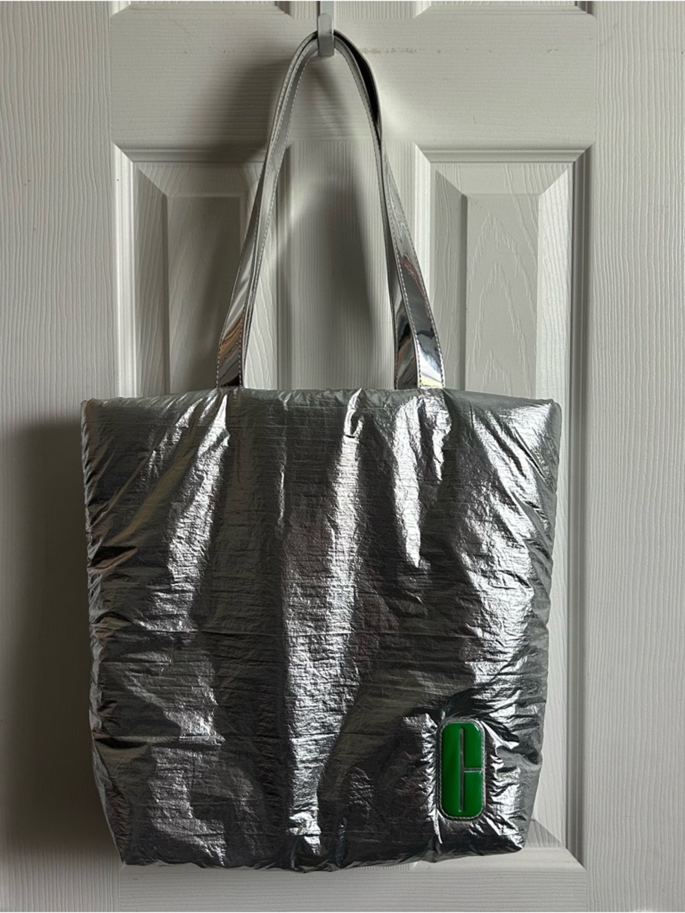 Clinique silver puffy shoulder tote bag
